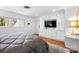 This bedroom has built-ins, recessed lighting, and hardwood flooring at 6147 Lake Providence Ln, Charlotte, NC 28277