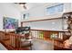 Home office with vaulted ceiling, hardwood floors, custom desk and clerestory windows at 6147 Lake Providence Ln, Charlotte, NC 28277