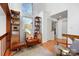 Upstairs living area with hardwood floors, clerestory windows and custom bookshelves at 6147 Lake Providence Ln, Charlotte, NC 28277