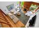 Bright living room with a vaulted ceiling, exposed wood, and a cozy fireplace at 6147 Lake Providence Ln, Charlotte, NC 28277