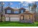 New construction home featuring a two-car garage, covered porch, and professionally landscaped lawn at 7117 Cobblefield Ln, Denver, NC 28037