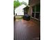 Spacious back deck perfect for outdoor grilling and entertaining by a brick house at 7798 Sand Trap Ln, Stanley, NC 28164