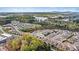 A scenic aerial shot featuring a lake and stunning greenery throughout the community at 7850 Fountaingrass Ln, Sherrills Ford, NC 28673