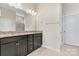 Bathroom with double vanity, granite countertop, ceramic tile floor, and great lighting at 7850 Fountaingrass Ln, Sherrills Ford, NC 28673