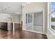 Open floor plan with a dining area and views of the kitchen, living room, and backyard at 7850 Fountaingrass Ln, Sherrills Ford, NC 28673