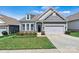 Charming single-Gathering home with a well-manicured lawn, classic curb appeal, and a two-car garage at 7850 Fountaingrass Ln, Sherrills Ford, NC 28673