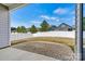 Covered patio with stone pavers and a large fenced backyard at 7850 Fountaingrass Ln, Sherrills Ford, NC 28673