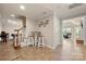 Open basement area featuring a table with chairs and stairs leading to an upper level at 7980 Bradford Ln, Denver, NC 28037