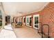 The home features an expansive covered patio area with space for outdoor entertaining and relaxation at 7980 Bradford Ln, Denver, NC 28037