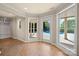 A sunroom leads to the pool area, creating a seamless indoor-outdoor experience at 7980 Bradford Ln, Denver, NC 28037