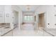 Bright bathroom with a soaking tub, a glass enclosed shower, and granite countertops at 819 Beauhaven Ln, Waxhaw, NC 28173