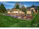 Community entrance with stone sign and manicured landscaping at 819 Beauhaven Ln, Waxhaw, NC 28173