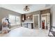 This game room features a bar area with sink, cabinetry, microwave and floating shelves, and an arcade game at 819 Beauhaven Ln, Waxhaw, NC 28173