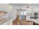 Well-equipped kitchen with stainless steel appliances, plenty of counter space, and modern fixtures at 819 Beauhaven Ln, Waxhaw, NC 28173