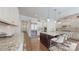 Modern kitchen featuring an island with seating, granite countertops, and stainless steel appliances at 819 Beauhaven Ln, Waxhaw, NC 28173