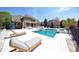 An inviting outdoor pool with a jacuzzi and plenty of space for lounging and soaking up the sun at 819 Beauhaven Ln, Waxhaw, NC 28173