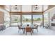 Relaxing screened porch with wood ceiling, ceiling fans and a beautiful pool view at 819 Beauhaven Ln, Waxhaw, NC 28173