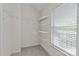 Bright closet features shelving and a window at 8311 Camberly Rd, Huntersville, NC 28078