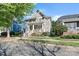 Attractive two-story home featuring a welcoming front porch with white railings at 8311 Camberly Rd, Huntersville, NC 28078
