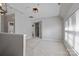 Spacious loft area with neutral carpet, ample natural light, and open floorplan at 8311 Camberly Rd, Huntersville, NC 28078