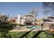 The backyard boasts a swimming pool, deck and mature trees, perfect for outdoor entertaining and recreation at 8718 Canter Post Dr, Charlotte, NC 28216