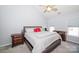 Bright bedroom featuring neutral walls, carpet, ceiling fan and furnishings at 8718 Canter Post Dr, Charlotte, NC 28216