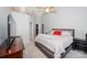 Bright bedroom featuring neutral walls, carpet, ceiling fan and walk-in closet at 8718 Canter Post Dr, Charlotte, NC 28216
