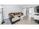 Comfortable living room with a sectional sofa, stylish coffee table, and sliding barn doors to another room at 8718 Canter Post Dr, Charlotte, NC 28216