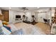 Multi-functional basement offering a home gym, office space, and a cozy seating area with a fireplace at 9025 Shields Dr, Huntersville, NC 28078