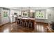 This open-concept kitchen features a large island with barstool seating, stainless steel appliances, and ample counter space at 9025 Shields Dr, Huntersville, NC 28078
