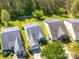 Aerial view of a residential neighborhood with tree-lined streets at 10441 Hugue Way, Charlotte, NC 28214