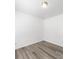 This bedroom is bright with fresh paint and new laminate flooring at 10441 Hugue Way, Charlotte, NC 28214