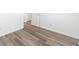 This bedroom is bright with fresh paint and new laminate flooring at 10441 Hugue Way, Charlotte, NC 28214