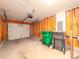 Picture of a two car garage with overhead lighting and white door at 10441 Hugue Way, Charlotte, NC 28214