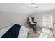 Cozy bedroom featuring a comfortable chair and soft lighting at 106 Berea Baptist Church Rd, Stanfield, NC 28163
