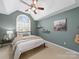 Inviting bedroom with arched window and unique decor at 106 Berea Baptist Church Rd, Stanfield, NC 28163
