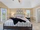 Beautiful main bedroom with a ceiling fan, large bed, and ample natural light from multiple windows at 106 Berea Baptist Church Rd, Stanfield, NC 28163