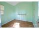 Empty bedroom featuring hardwood floors and a built-in shelf at 11100 Pine Grove Ave, Mint Hill, NC 28227