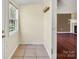 Bright entryway with tile flooring and access to a spacious room at 11100 Pine Grove Ave, Mint Hill, NC 28227