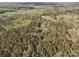 Scenic aerial view of property surrounded by lush greenery and surrounding landscapes at 11170 Nc Hwy 73 E Hwy, Mount Pleasant, NC 28124