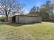 Exterior daytime view of a metal barn with natural light and surrounding trees at 11170 Nc Hwy 73 E Hwy, Mount Pleasant, NC 28124