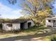 Exterior view of a detached garage next to a house with a deck at 11170 Nc Hwy 73 E Hwy, Mount Pleasant, NC 28124