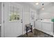 Laundry room with washer, dryer, exterior door, and neutral paint at 11170 Nc Hwy 73 E Hwy, Mount Pleasant, NC 28124