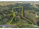 Aerial view showing property boundaries amid lush greenery, highlighting privacy and natural surroundings at 11170 Nc Hwy 73 E Hwy, Mount Pleasant, NC 28124