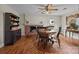 Traditional dining room with hardwood floors, a brick fireplace, and a vintage hutch at 11170 Nc Hwy 73 E Hwy, Mount Pleasant, NC 28124