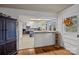 Bright kitchen showcasing white cabinets and an inviting breakfast bar with a full view into the kitchen at 11170 Nc Hwy 73 E Hwy, Mount Pleasant, NC 28124