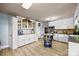 Well-equipped kitchen with white cabinets, a peninsula island, and modern appliances at 11170 Nc Hwy 73 E Hwy, Mount Pleasant, NC 28124