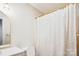 Bright bathroom showcasing a vanity and a shower with a textured curtain, offering comfort and style at 1162 Westover Cir, Rock Hill, SC 29732