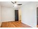 Spacious bedroom with a ceiling fan, closet, and hardwood floors offering a comfortable living space at 1162 Westover Cir, Rock Hill, SC 29732
