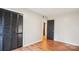 An empty bedroom with a closet and wood-look floors at 1162 Westover Cir, Rock Hill, SC 29732